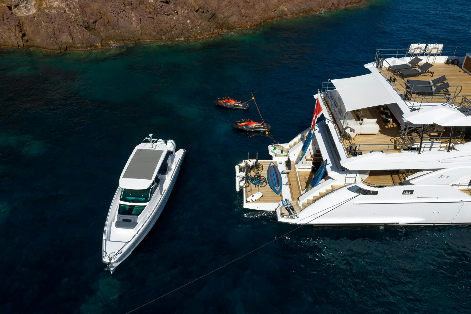 a group of boats in a body of water aboard JACOZAMI Yacht for Sale