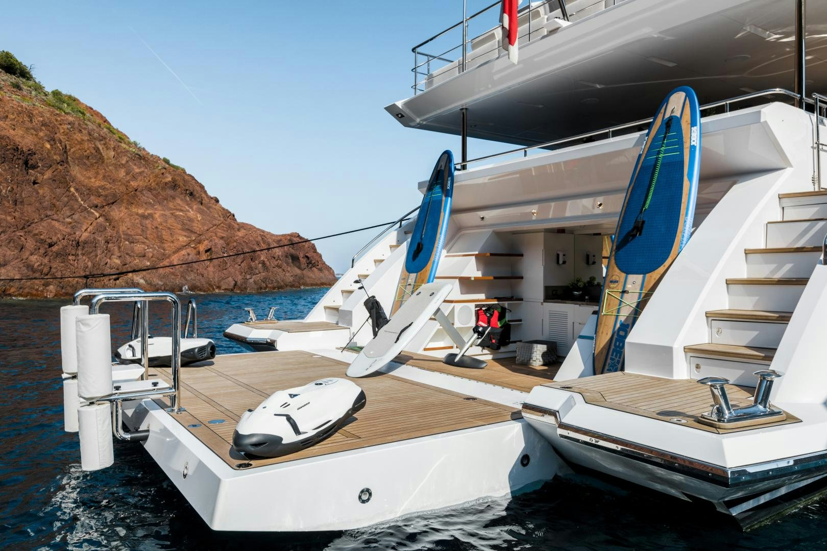 a boat docked at a pier aboard JACOZAMI Yacht for Sale