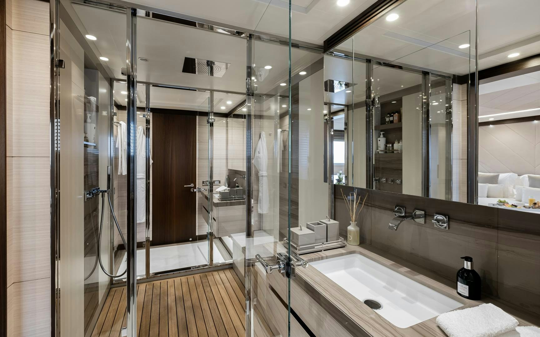 a bathroom with a glass shower aboard JACOZAMI Yacht for Sale