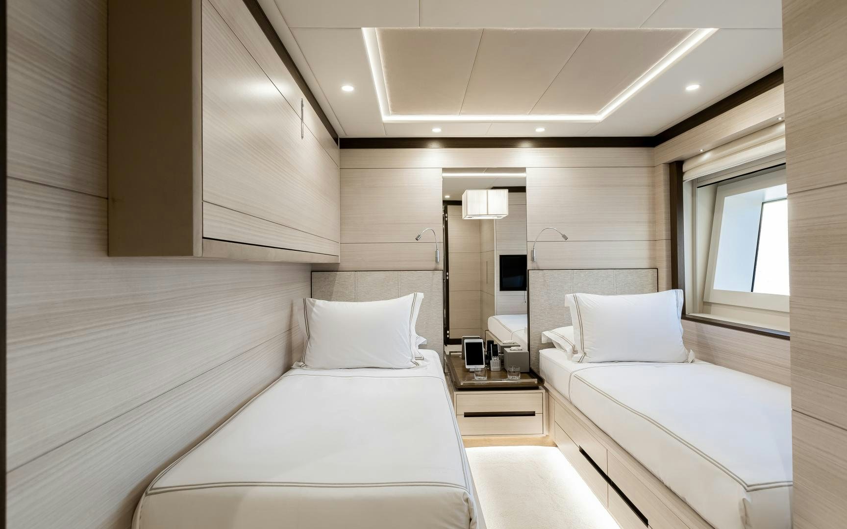 a room with two beds aboard JACOZAMI Yacht for Sale