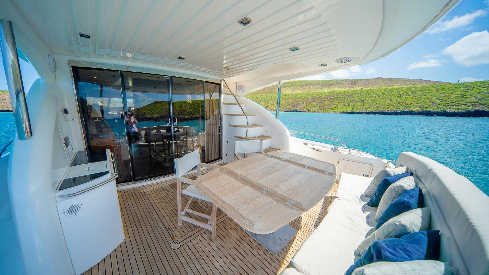 a boat with a bench on the deck aboard GOOD LACK Yacht for Sale