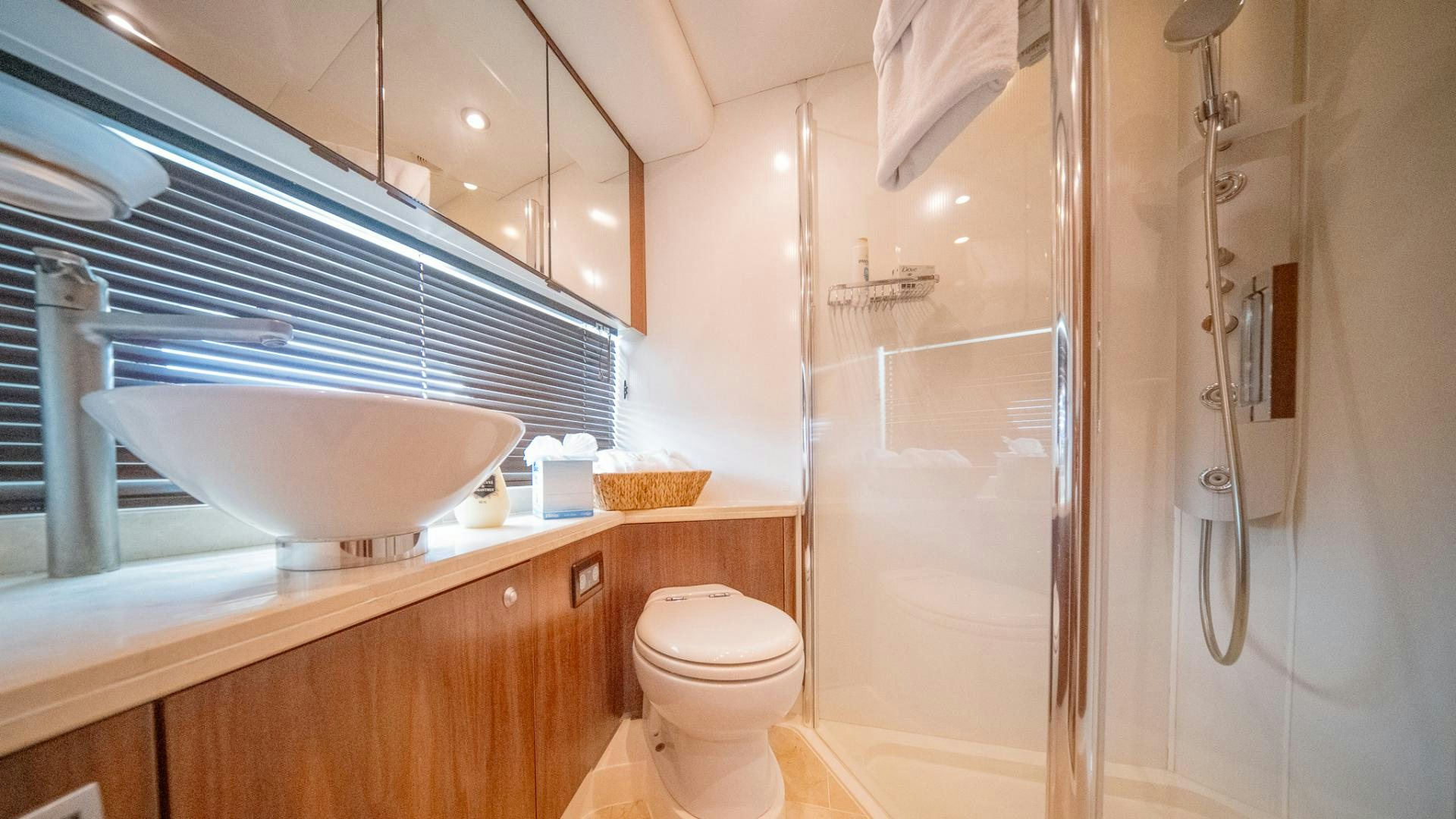 a bathroom with a sink and toilet aboard GOOD LACK Yacht for Sale