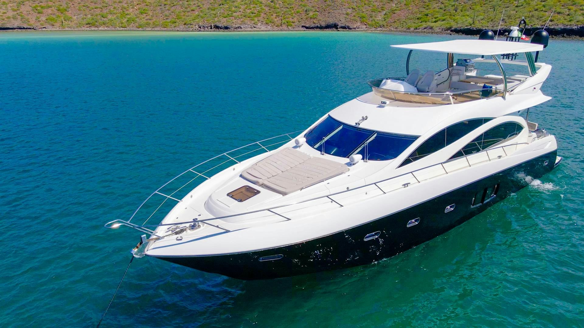 a white yacht on the water aboard GOOD LACK Yacht for Sale