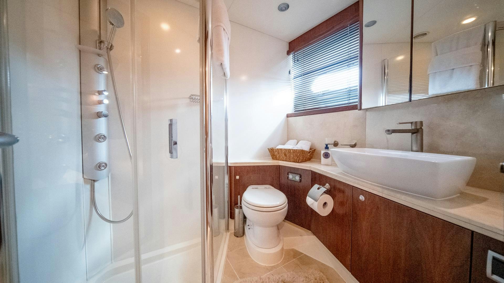 a bathroom with a sink toilet and shower aboard GOOD LACK Yacht for Sale