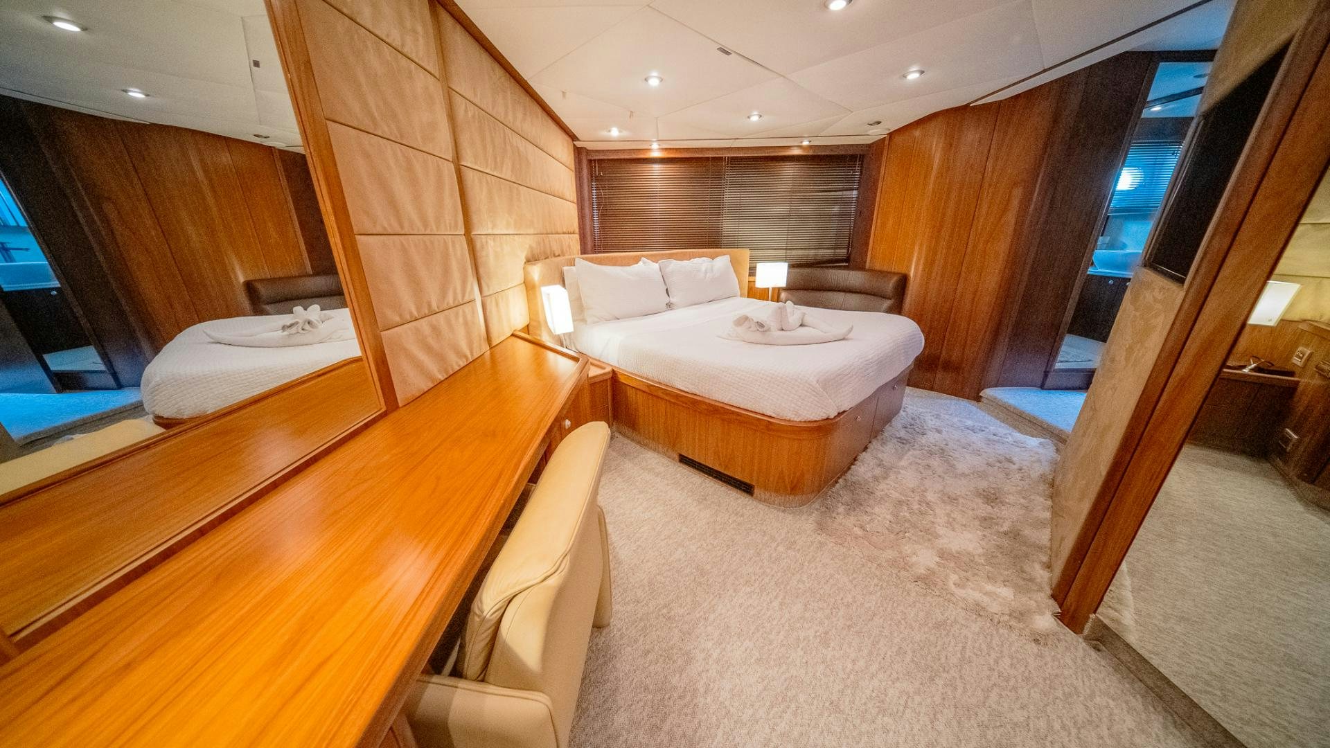 a room with a bed and a chair aboard GOOD LACK Yacht for Sale