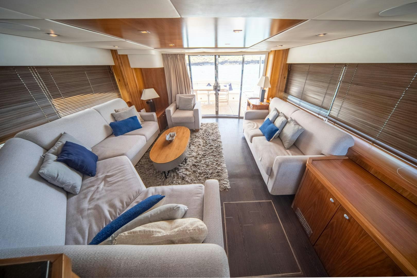a living room with a large window aboard GOOD LACK Yacht for Sale