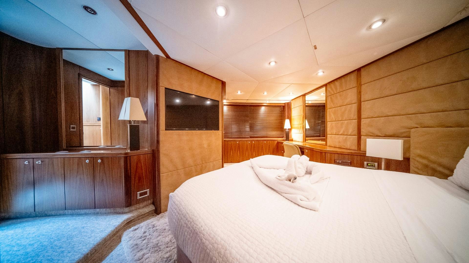 a room with a bed and a desk aboard GOOD LACK Yacht for Sale