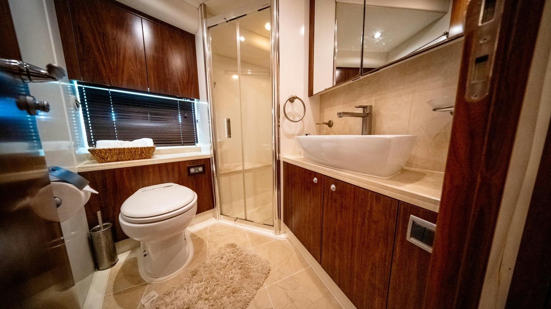 a bathroom with a sink toilet and a bathtub aboard GOOD LACK Yacht for Sale