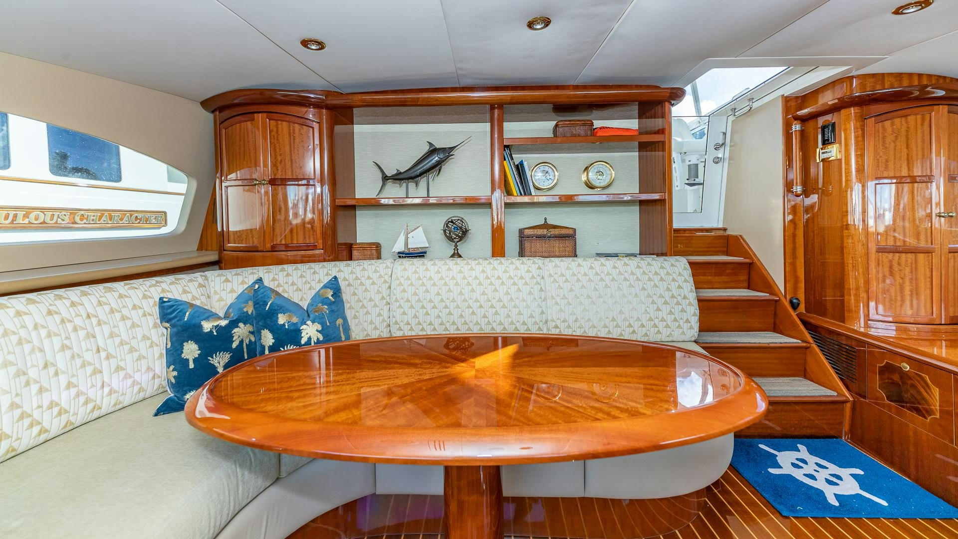 a room with a couch and a table aboard HOPE FLOATS Yacht for Sale