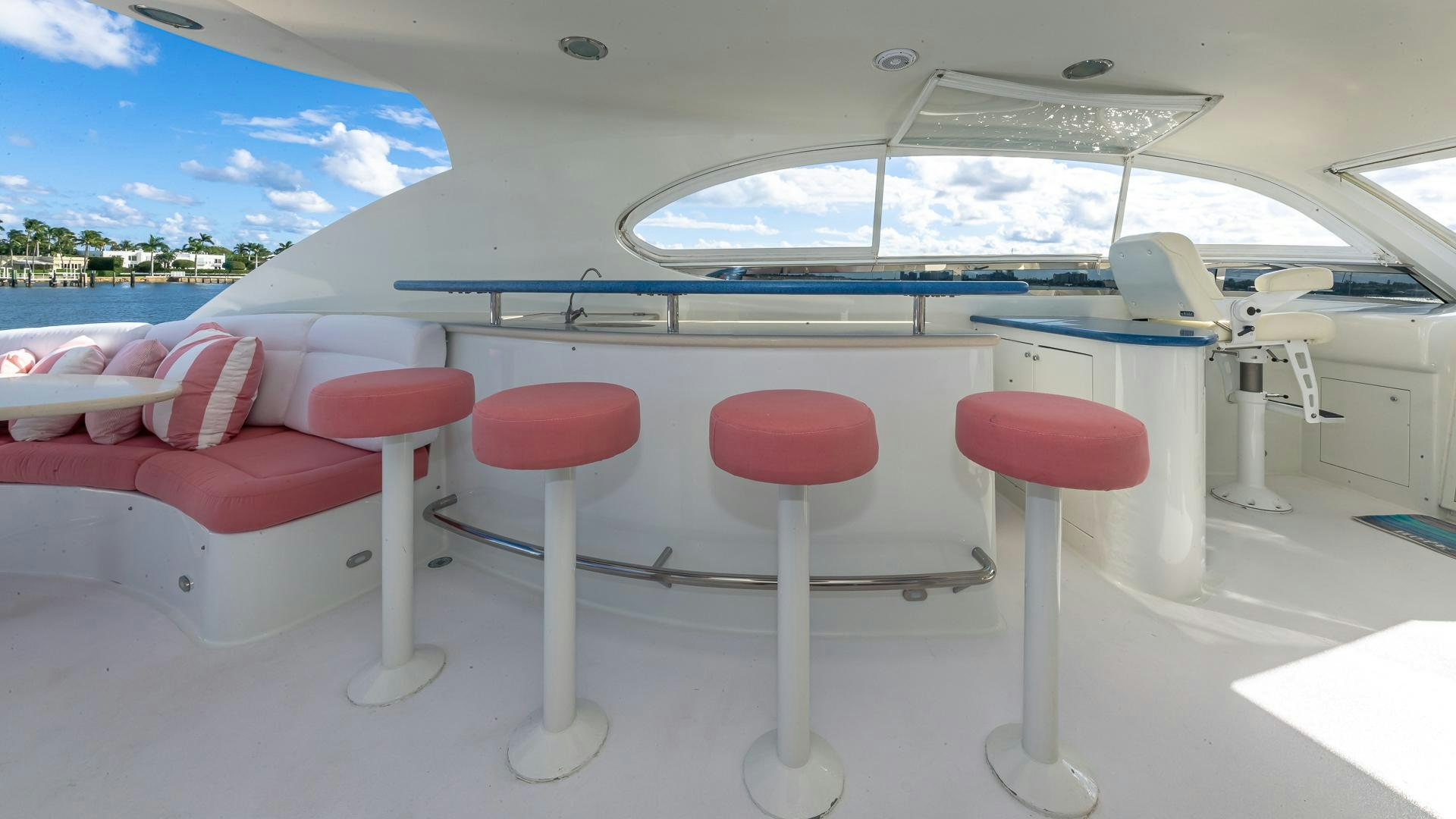 a boat with red stools aboard HOPE FLOATS Yacht for Sale