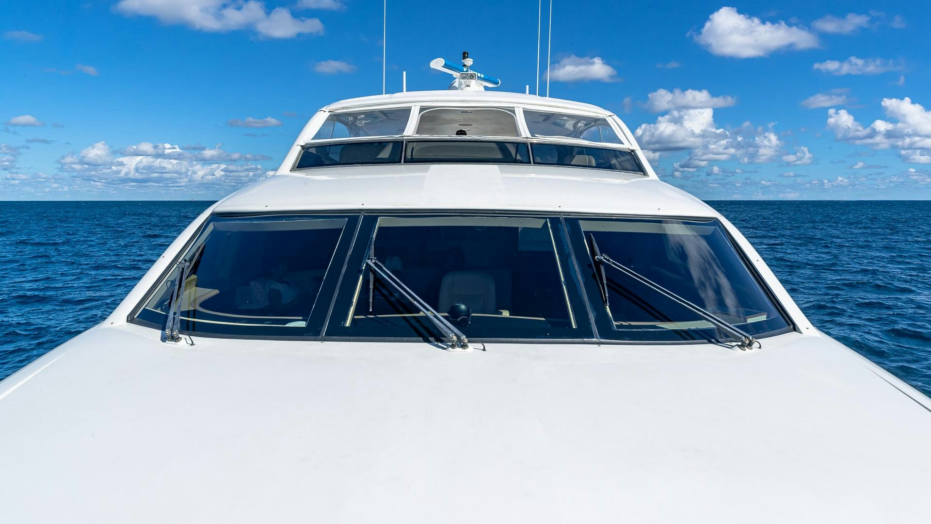 a white yacht on the water aboard HOPE FLOATS Yacht for Sale