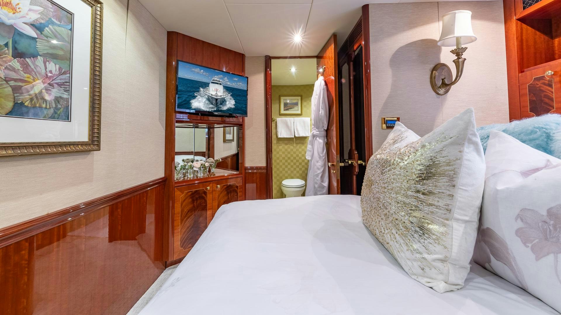 a bed with white sheets aboard HOPE FLOATS Yacht for Sale