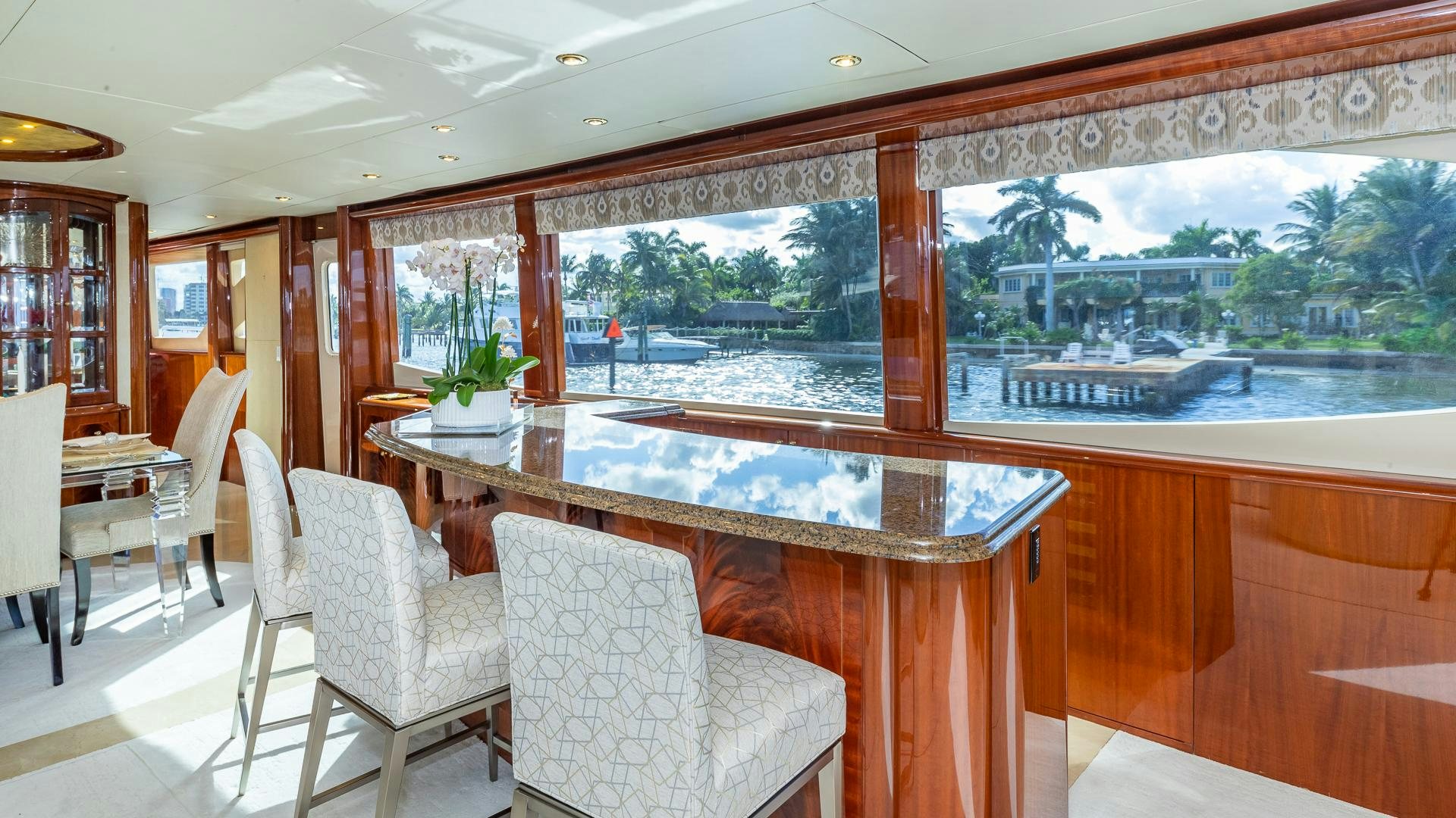 a large dining table in a room aboard HOPE FLOATS Yacht for Sale