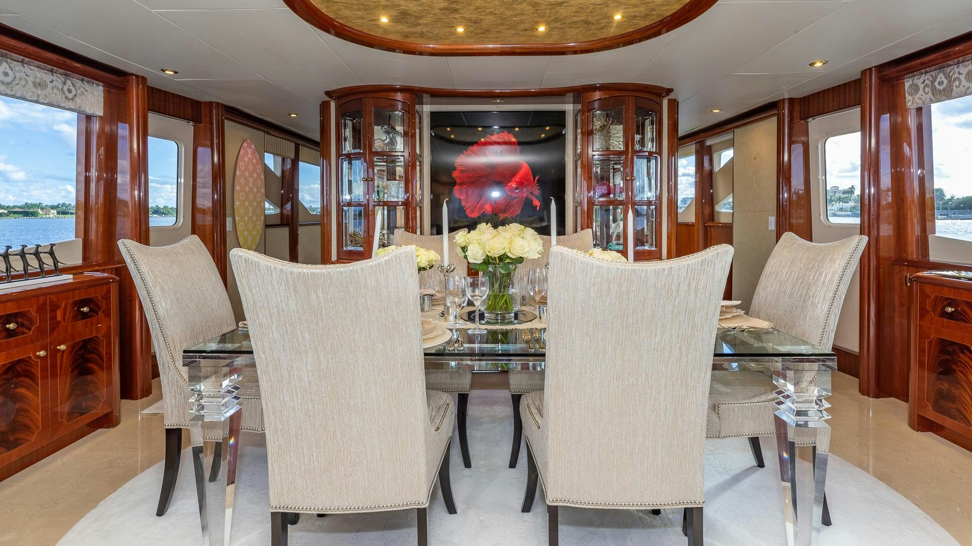 a room with chairs and a table aboard HOPE FLOATS Yacht for Sale