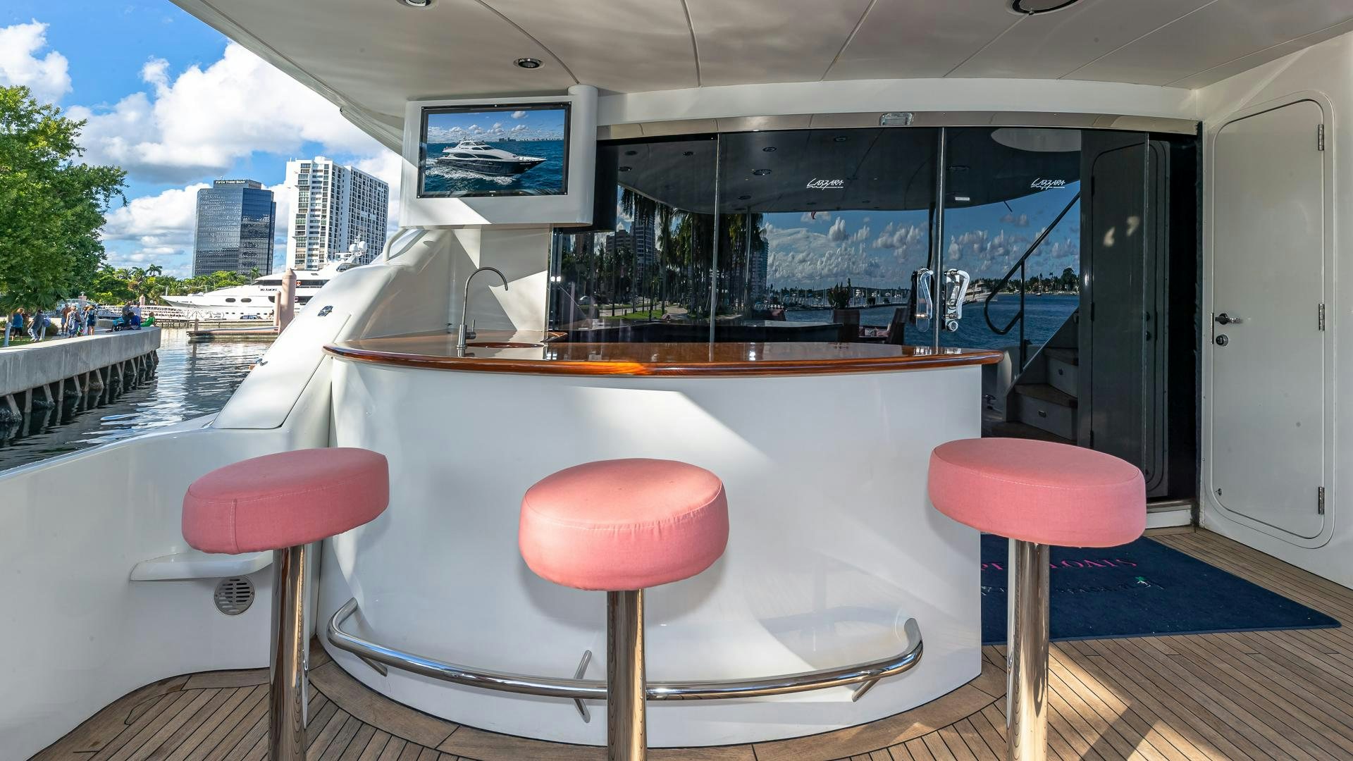 a table with stools on it aboard HOPE FLOATS Yacht for Sale