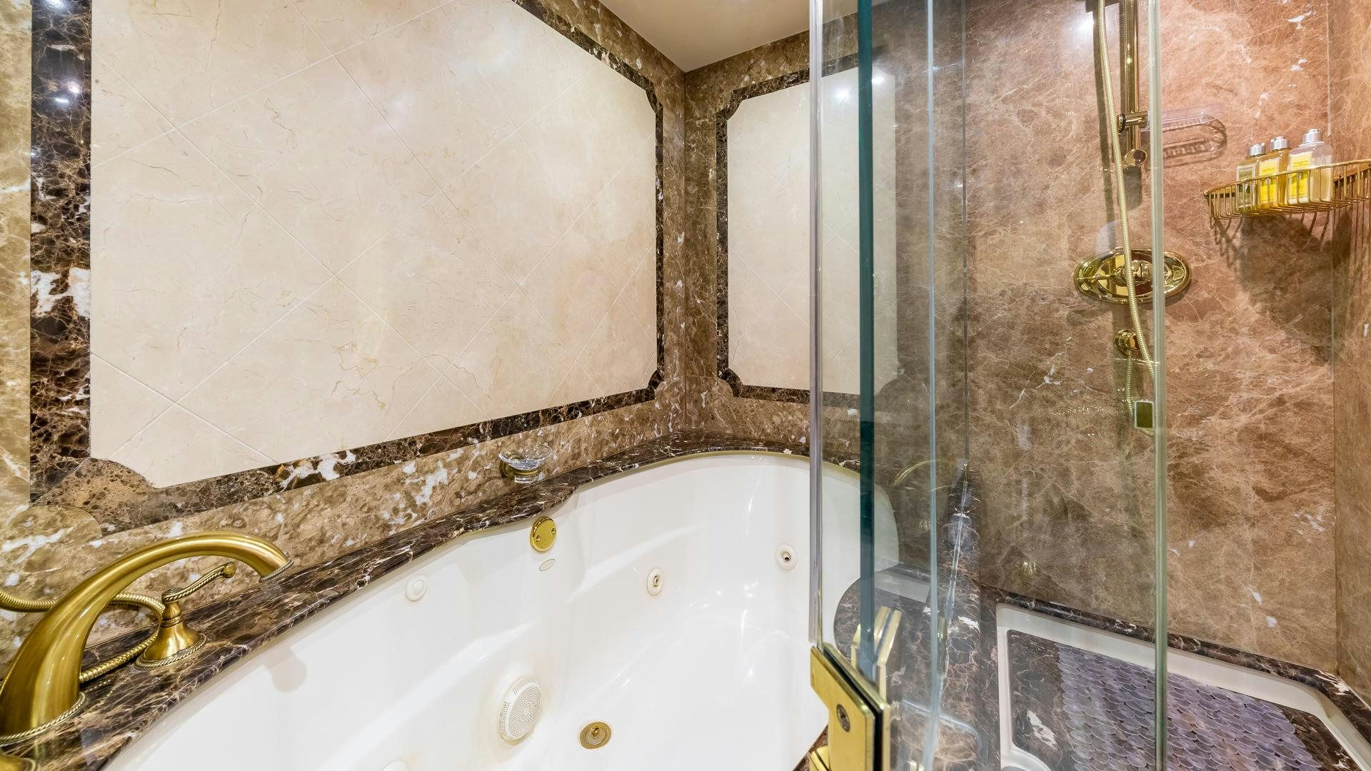 a bathroom with a tub and shower aboard HOPE FLOATS Yacht for Sale