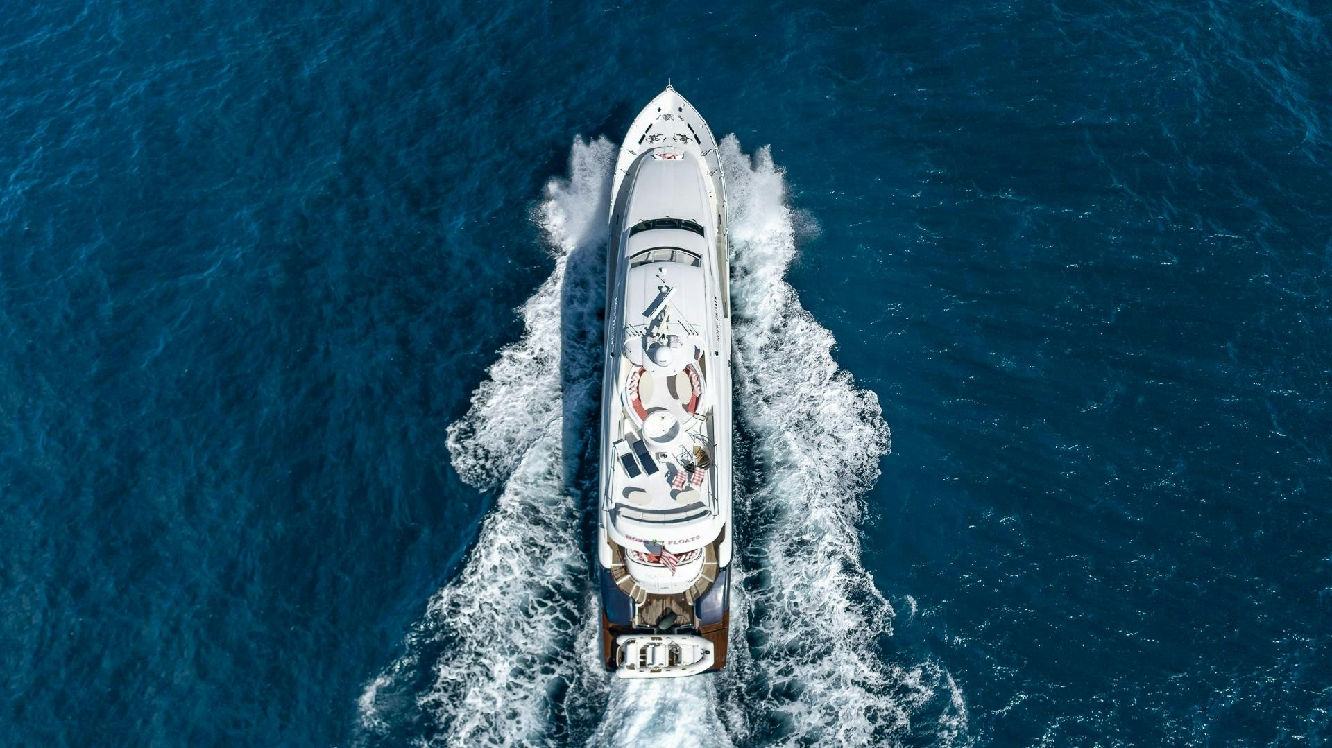 a white snowboard in the snow aboard HOPE FLOATS Yacht for Sale