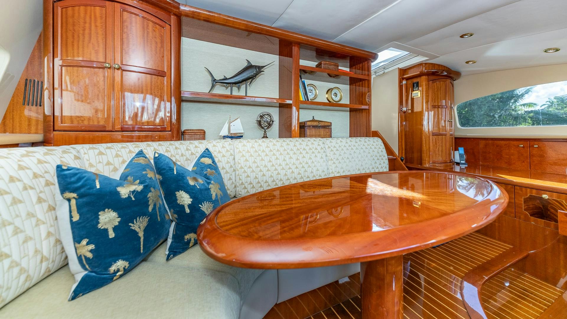 a living room with a couch and a table aboard HOPE FLOATS Yacht for Sale