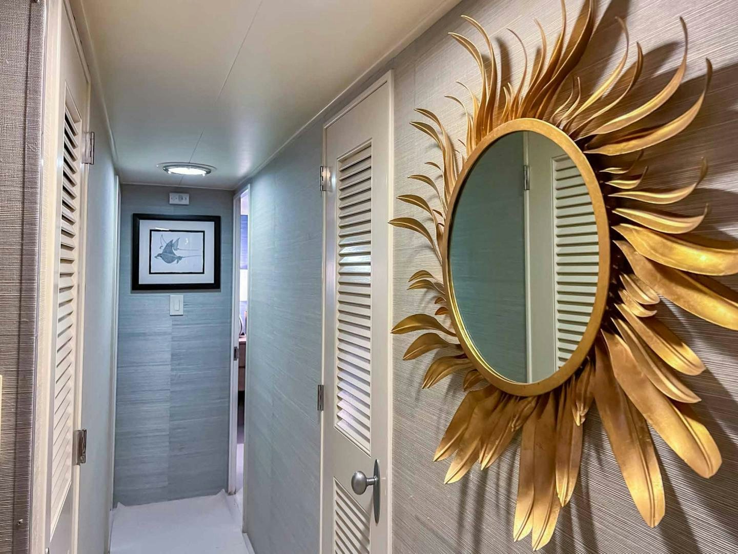 a mirror on a wall aboard FREEDOM Yacht for Sale
