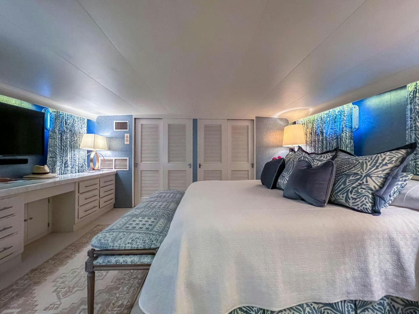 a bedroom with a large bed aboard FREEDOM Yacht for Sale