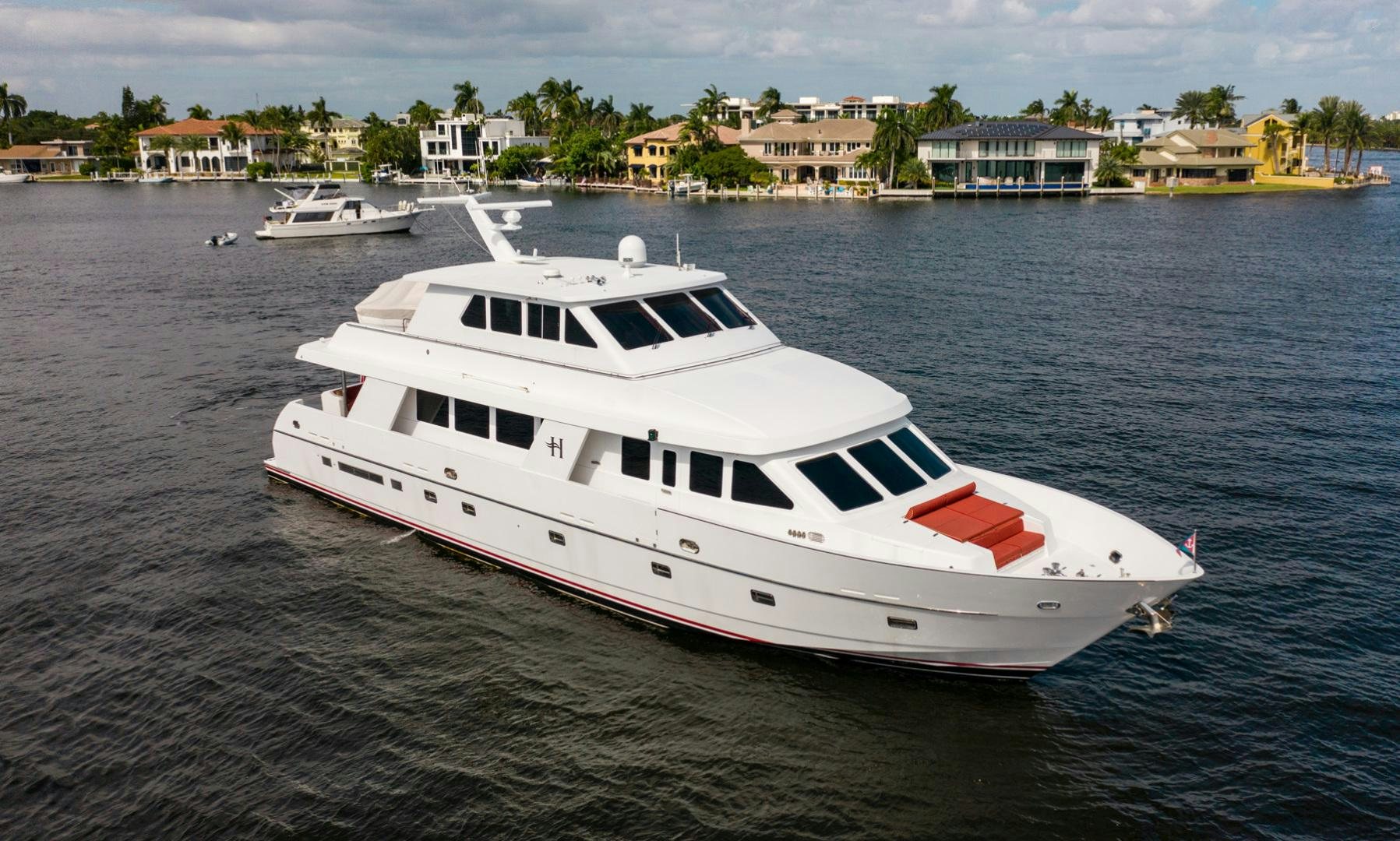 a white yacht on the water aboard BOXES II Yacht for Sale
