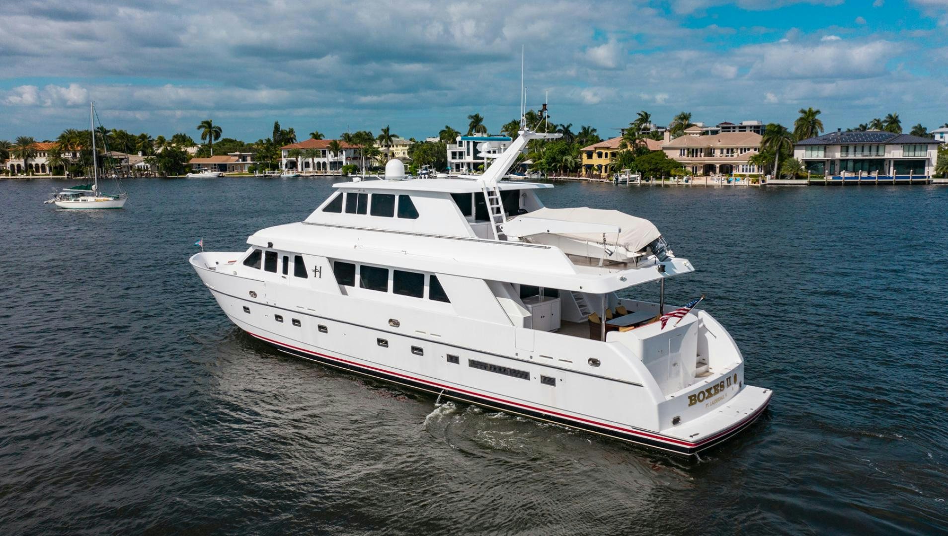a white boat on the water aboard BOXES II Yacht for Sale