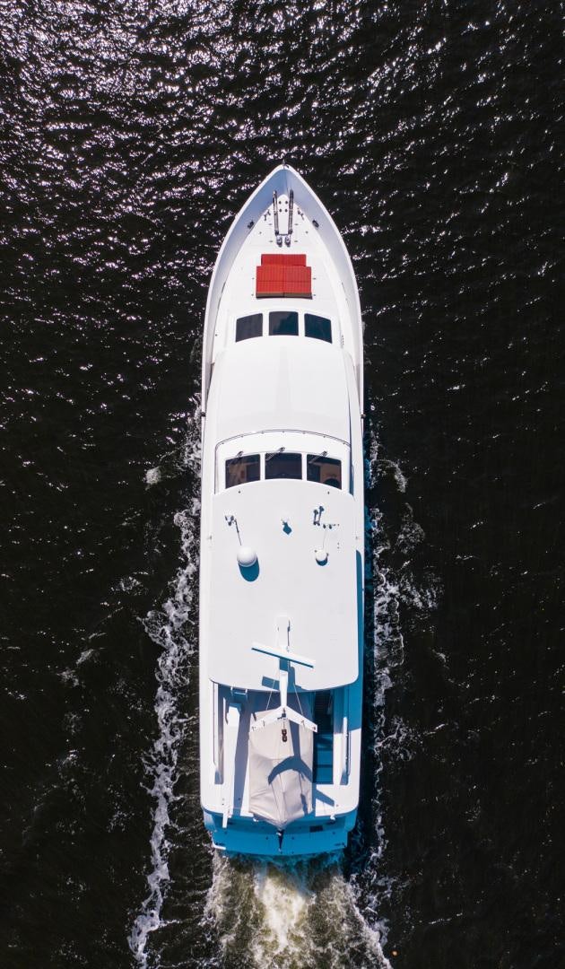 a white boat in water aboard BOXES II Yacht for Sale