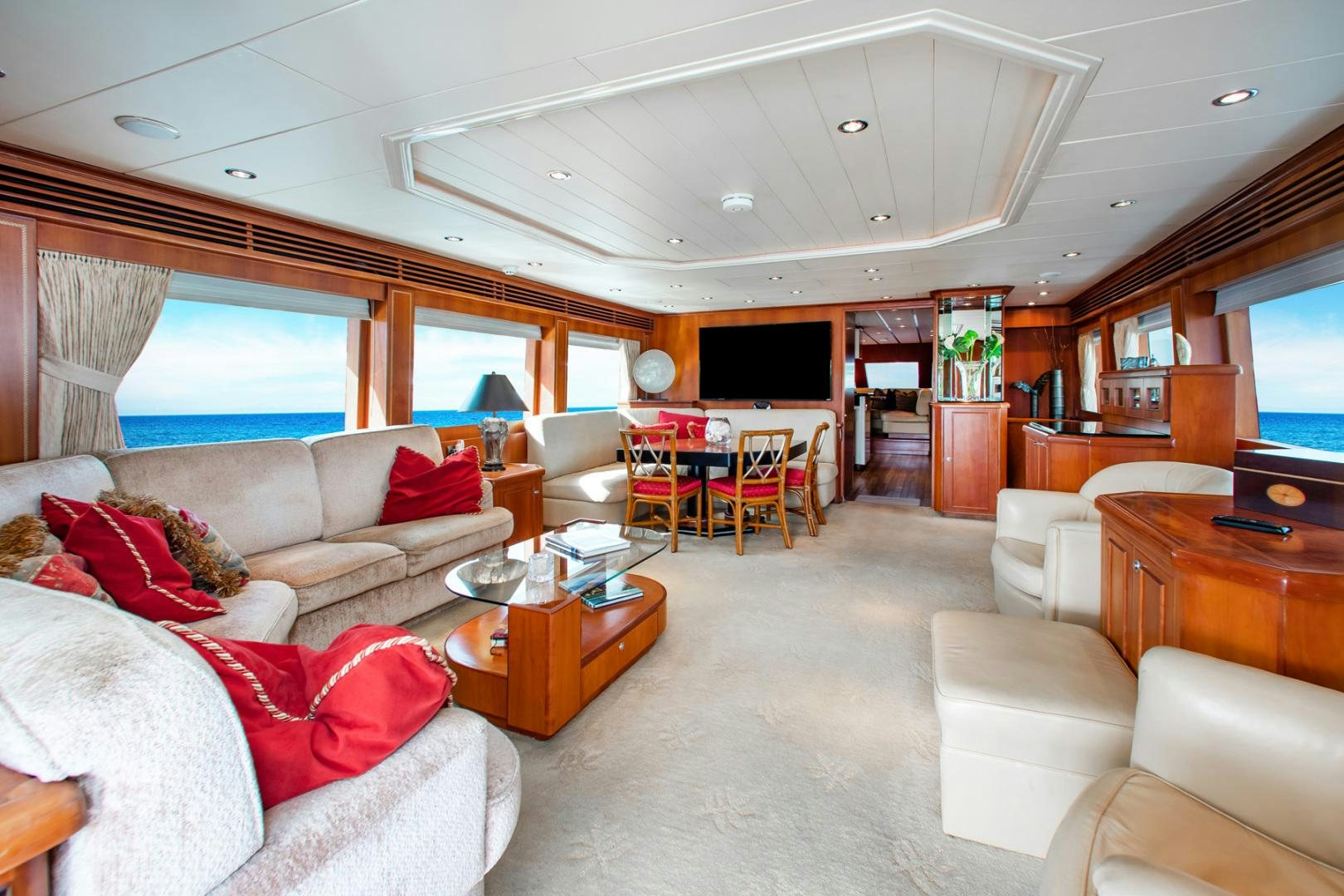 a living room with a large window aboard BOXES II Yacht for Sale