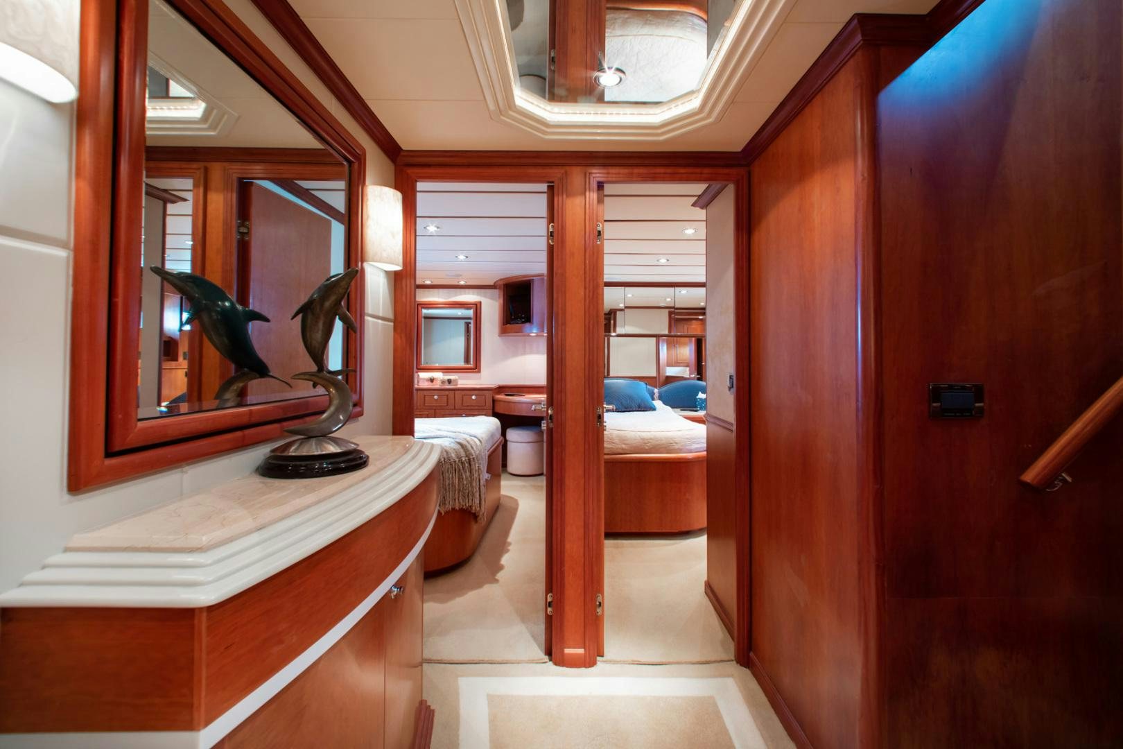 a room with a mirror and a bed aboard BOXES II Yacht for Sale