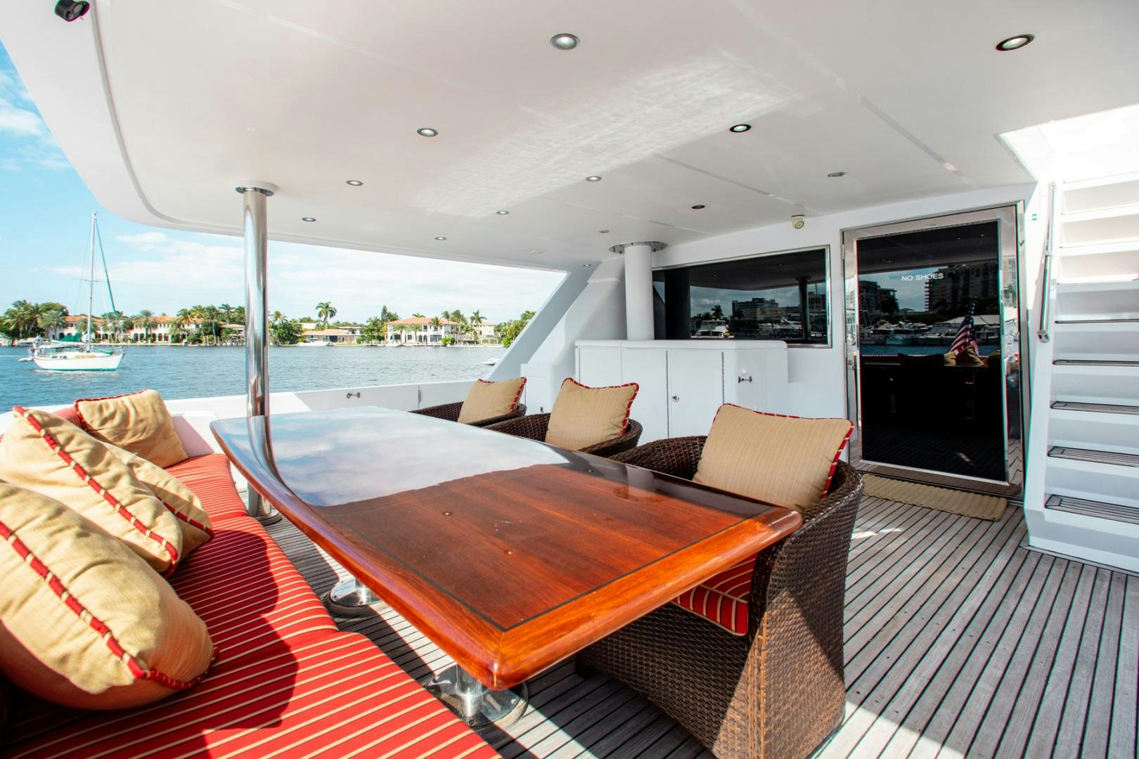 a large living room with a large balcony aboard BOXES II Yacht for Sale
