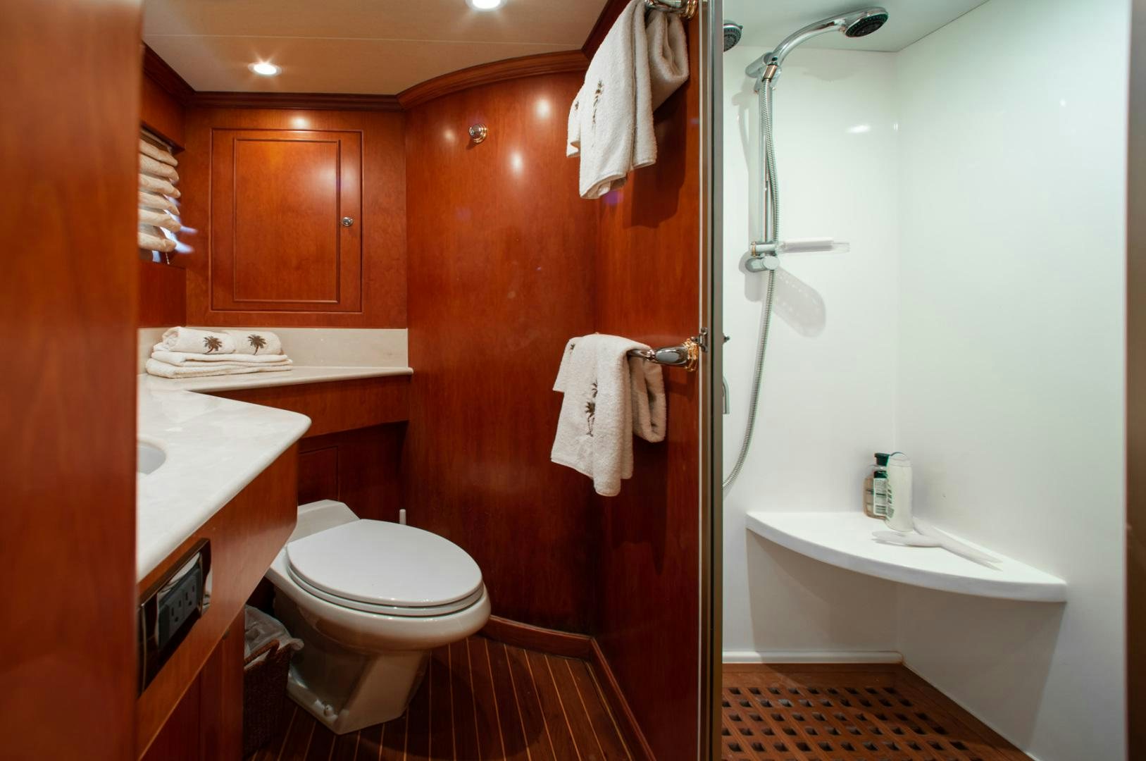 a bathroom with a toilet and sink aboard BOXES II Yacht for Sale