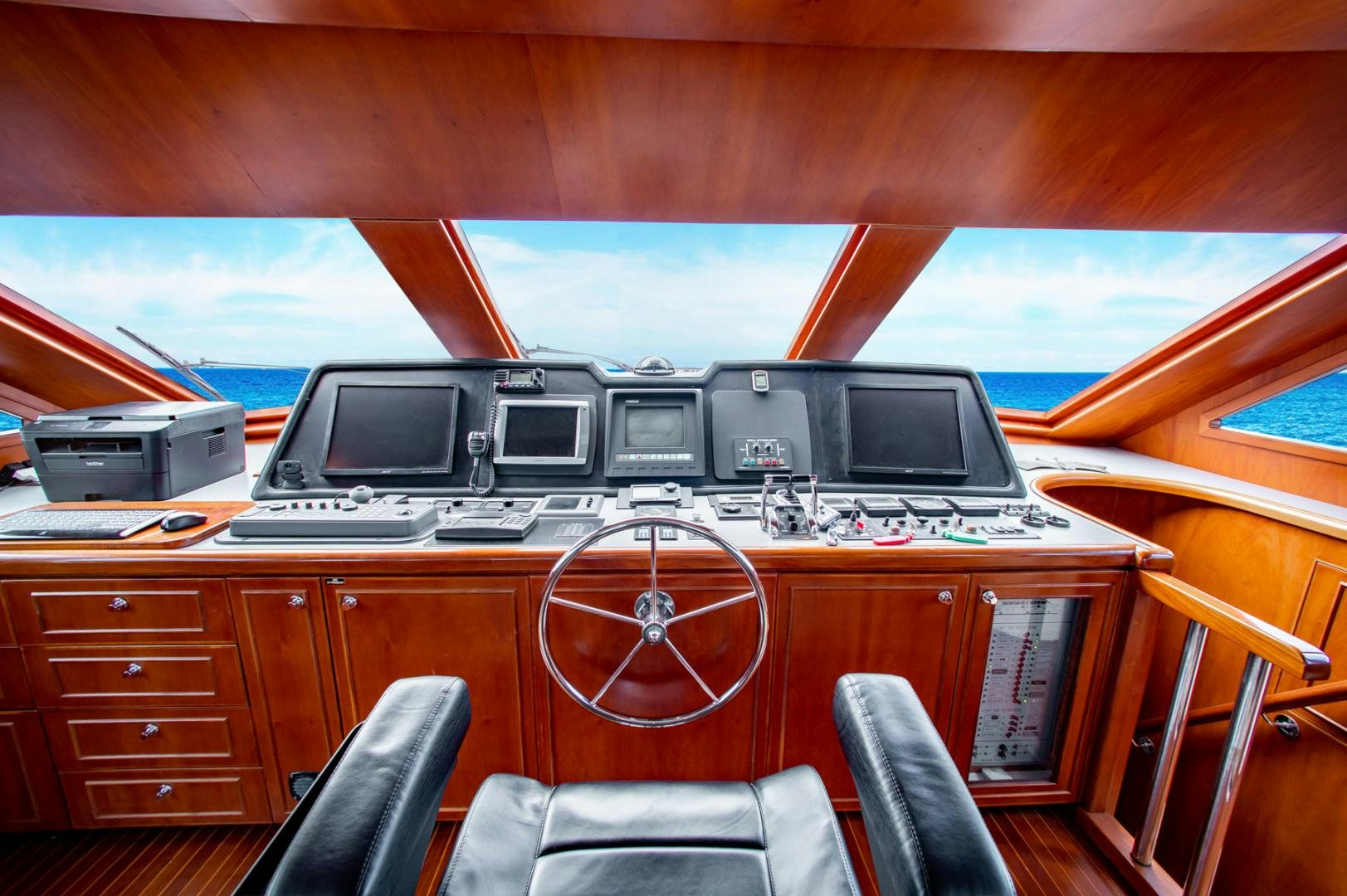 a room with a desk and a computer aboard BOXES II Yacht for Sale