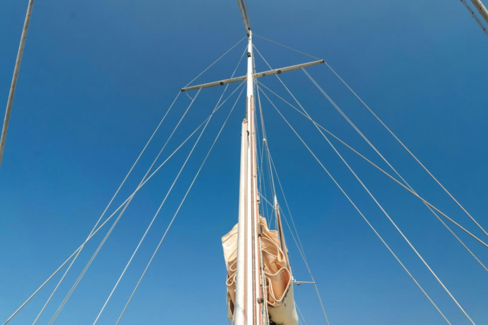 a tall white tower aboard Iolair Mara Yacht for Sale