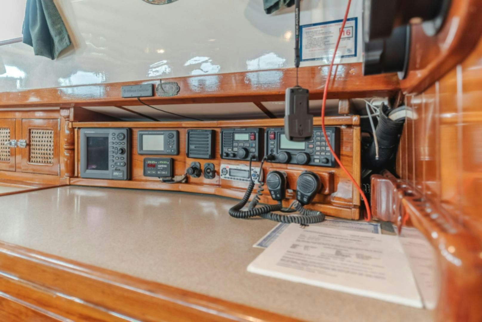 a group of electrical devices on a table aboard Iolair Mara Yacht for Sale
