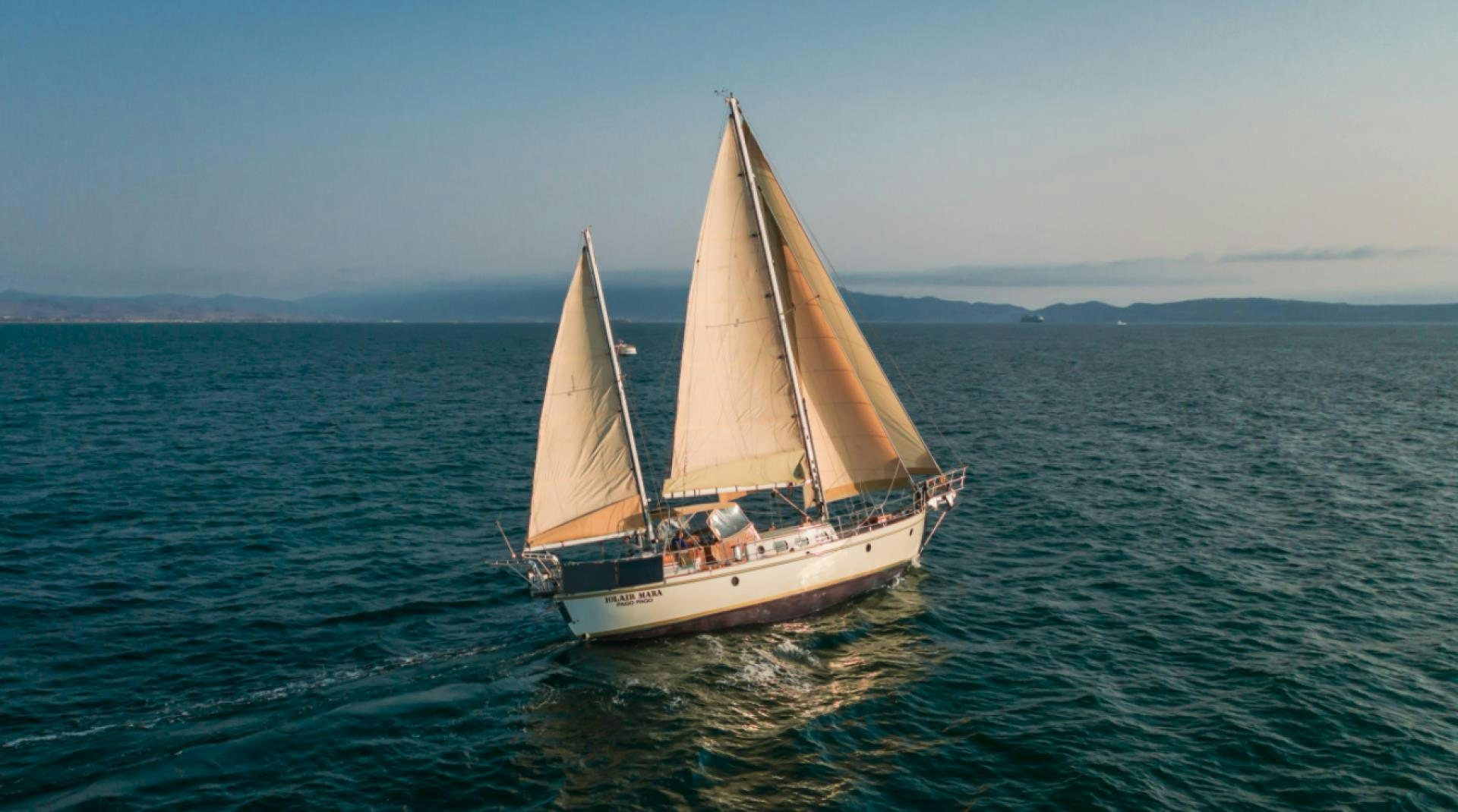 a sailboat on the water aboard Iolair Mara Yacht for Sale