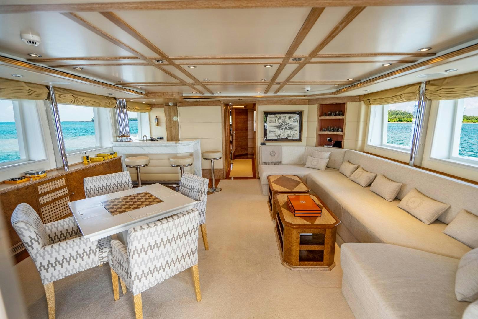 a living room with a couch and a table aboard ARTEMISEA Yacht for Sale