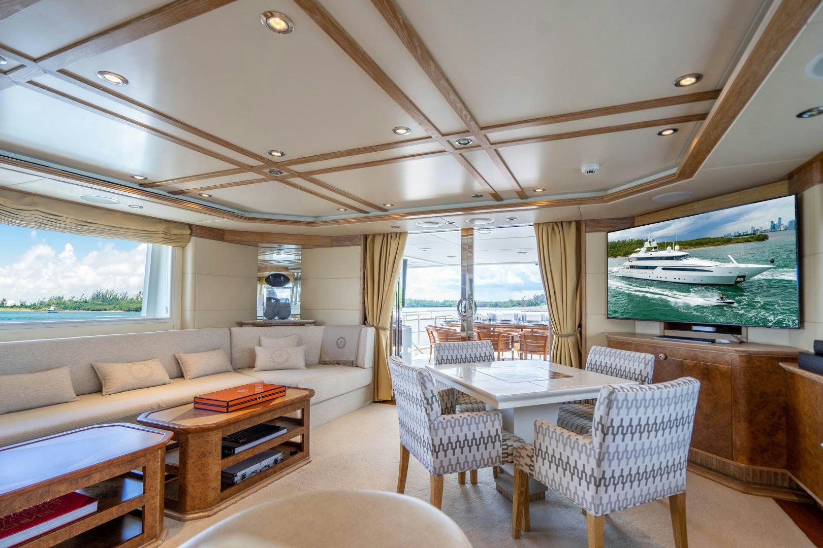 a living room with a large window aboard ARTEMISEA Yacht for Sale