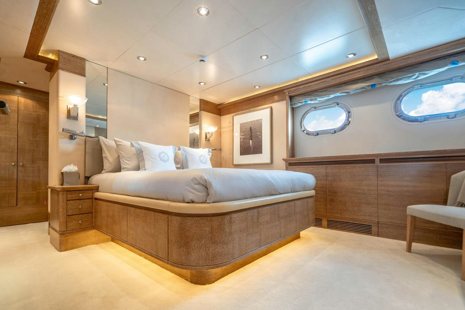 a large bed in a room aboard ARTEMISEA Yacht for Sale