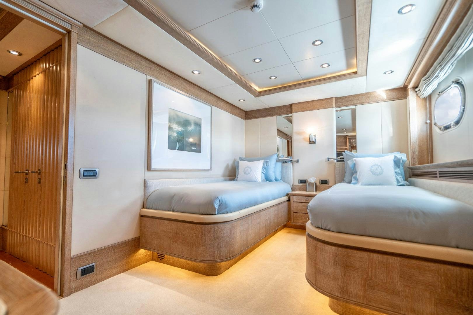 a room with a bed and a couch aboard ARTEMISEA Yacht for Sale