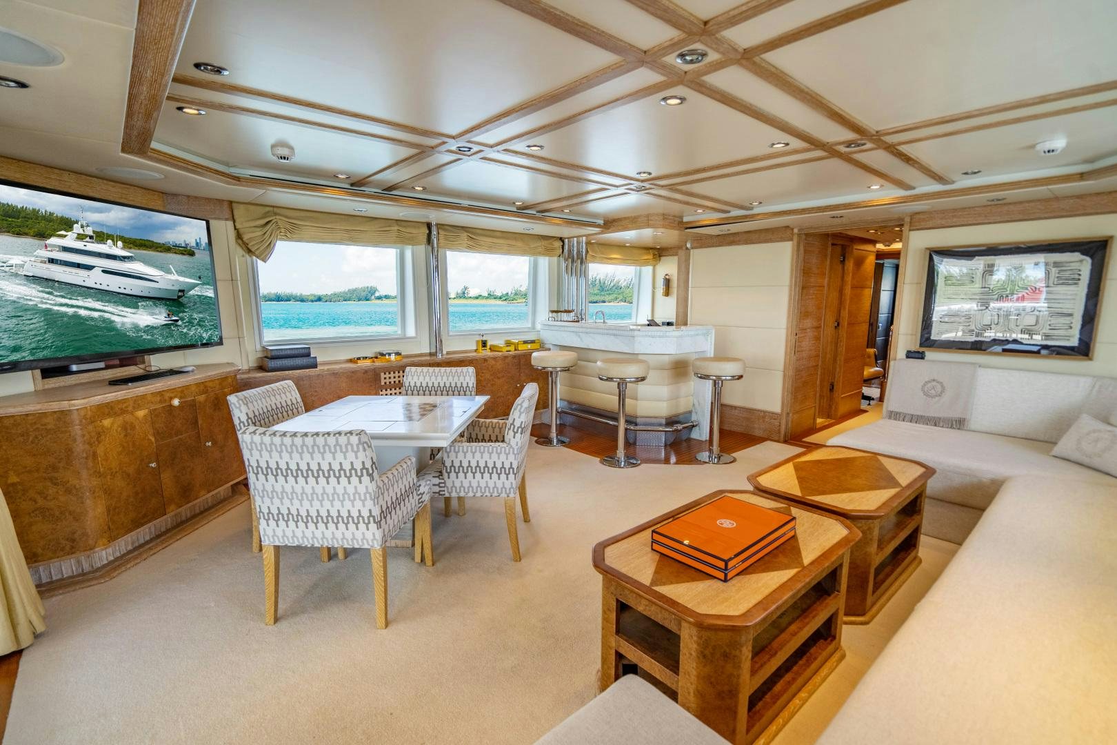 a room with a table and chairs aboard ARTEMISEA Yacht for Sale