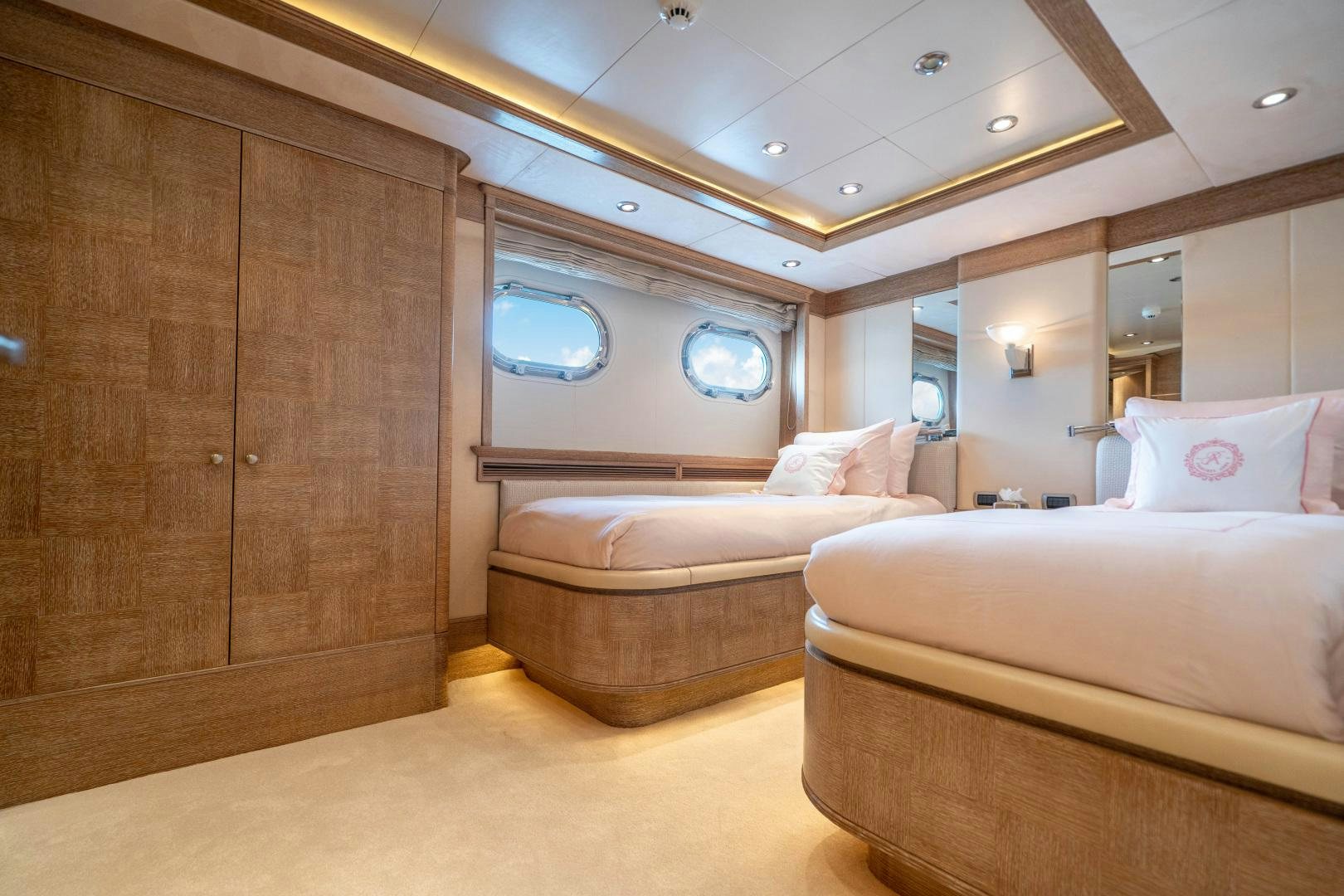 a room with a bed and a cupboard aboard ARTEMISEA Yacht for Sale