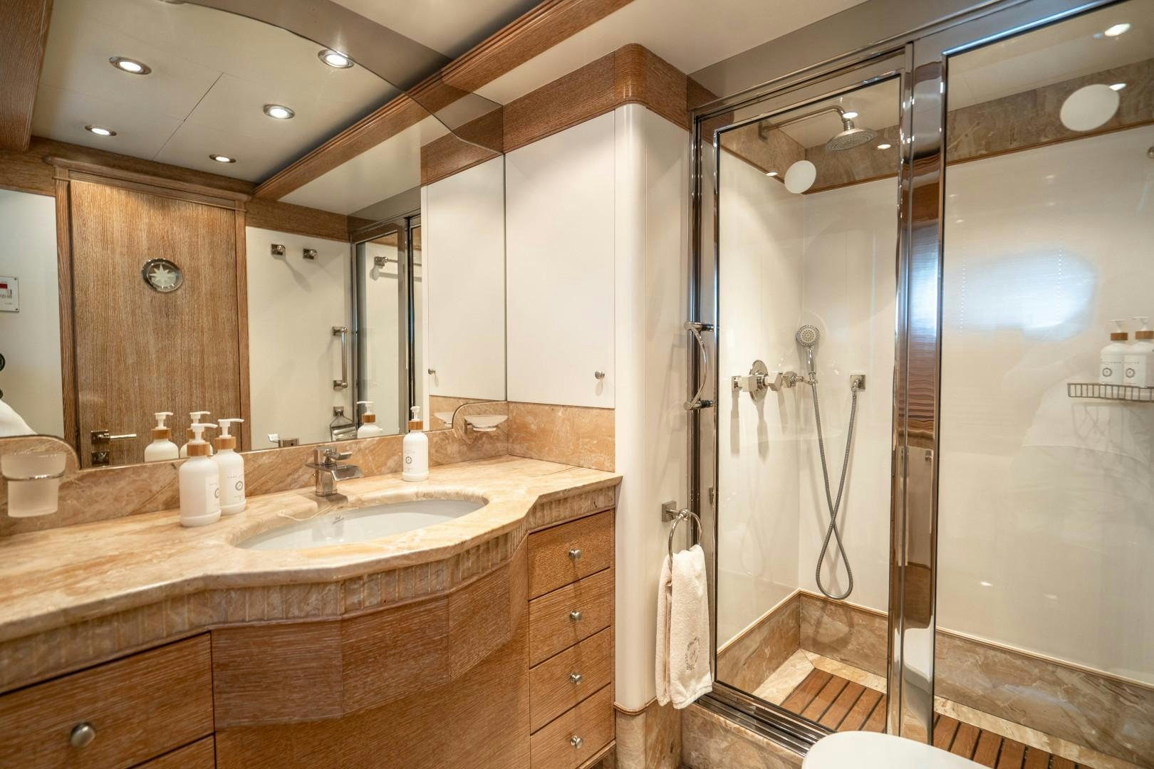 a bathroom with a large mirror aboard ARTEMISEA Yacht for Sale