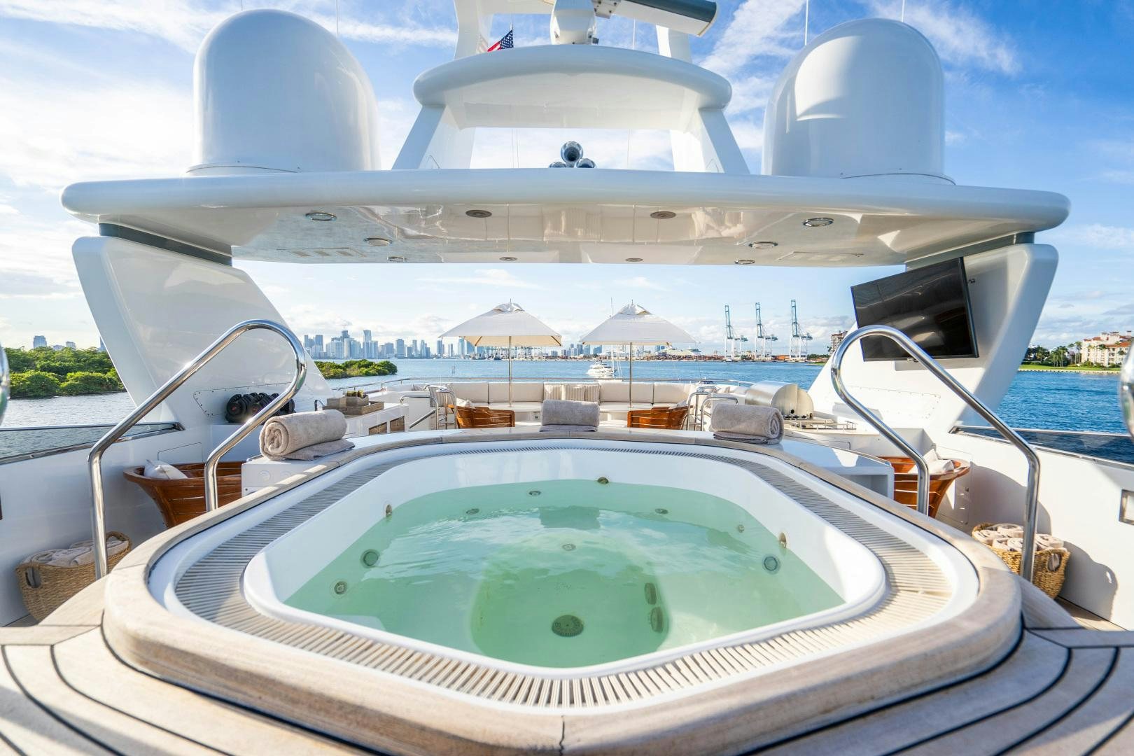 a large white building with a pool aboard ARTEMISEA Yacht for Sale