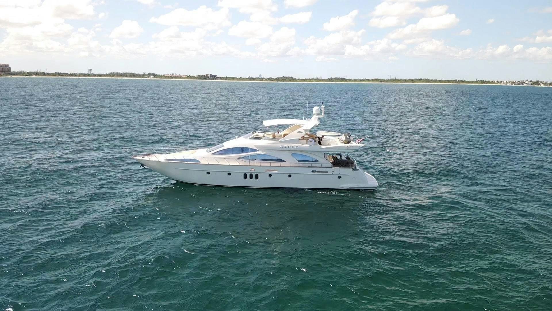 a white boat in the water aboard AZURE Yacht for Sale