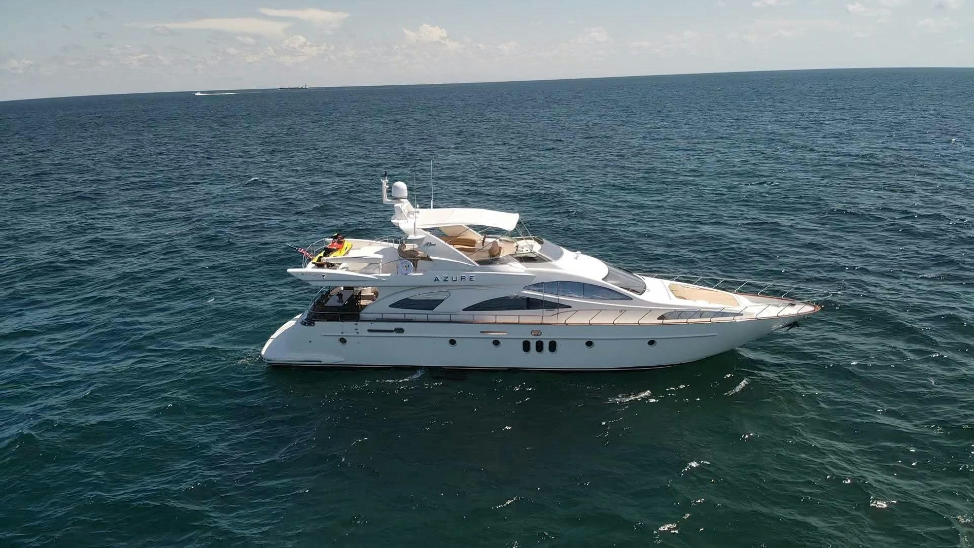 a white boat in the water aboard AZURE Yacht for Sale