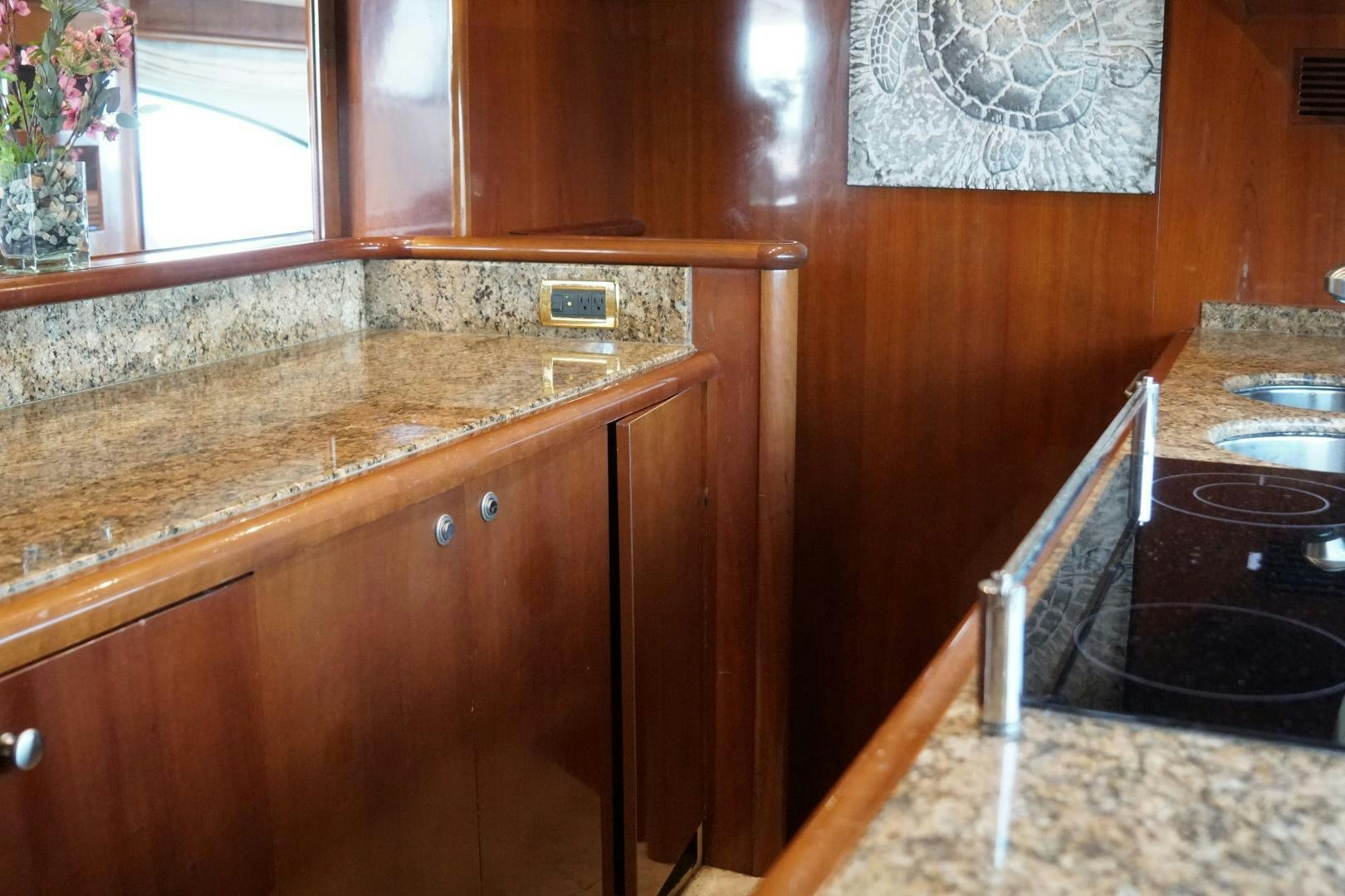 a kitchen with a marble counter top aboard AZURE Yacht for Sale