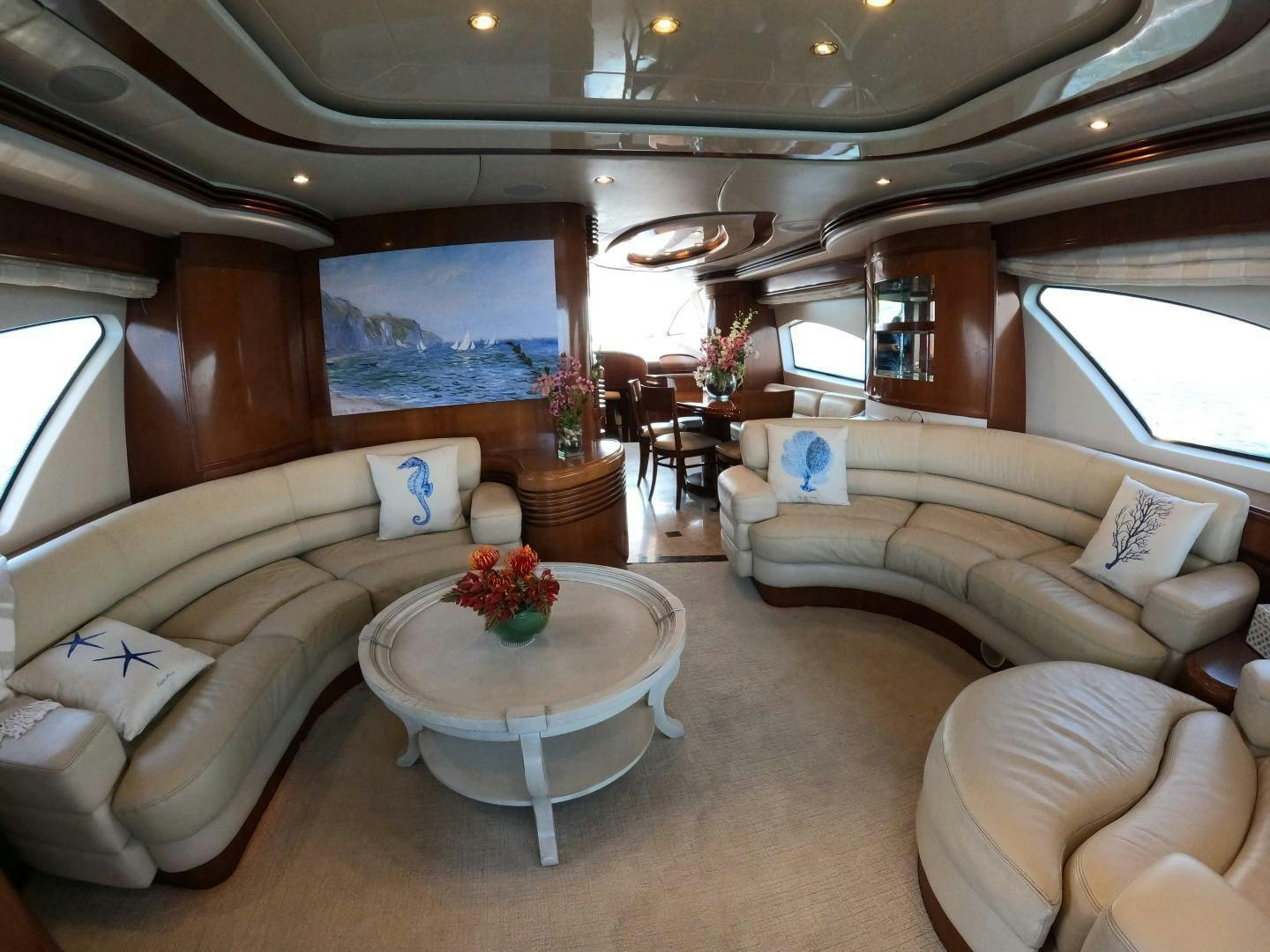 a living room with a couch and a table aboard AZURE Yacht for Sale