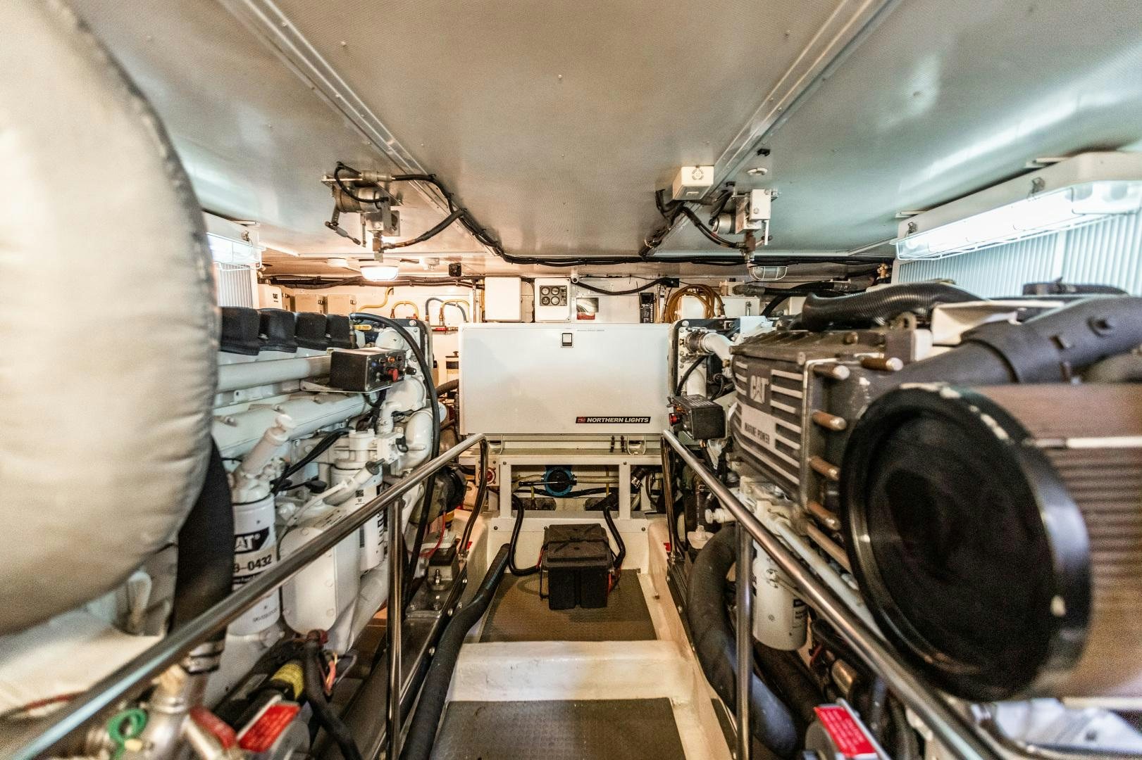 a large machine in a room aboard TJ SQUARED Yacht for Sale