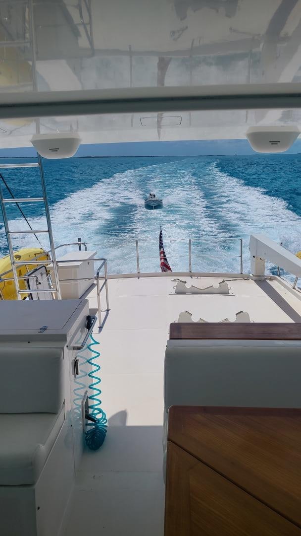 a boat on the water aboard TJ SQUARED Yacht for Sale