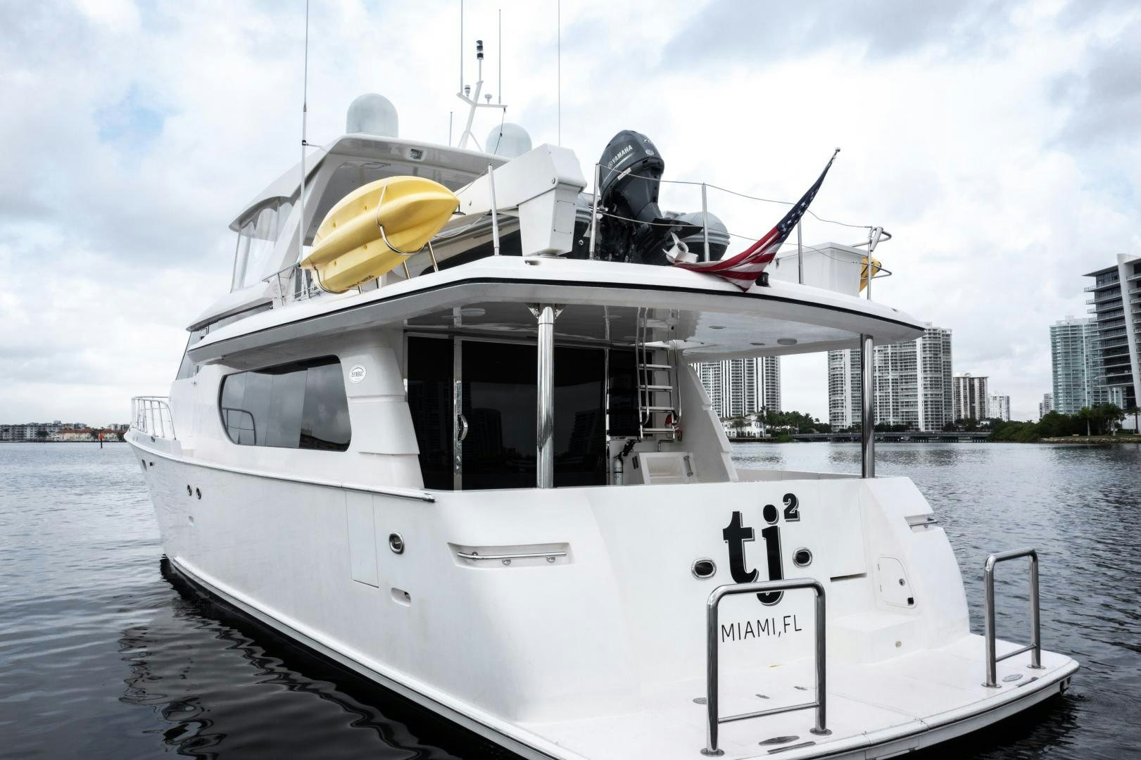 a boat with a large paddle on the front aboard TJ SQUARED Yacht for Sale